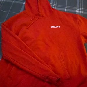 James Charles orange hoodie